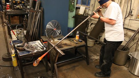 Frame of Martin Demaine blowing glass blindfold