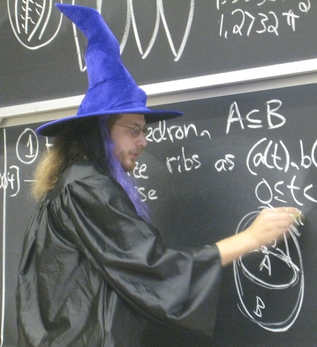 [Erik Demaine lecturing in Halloween costume, 2007.]